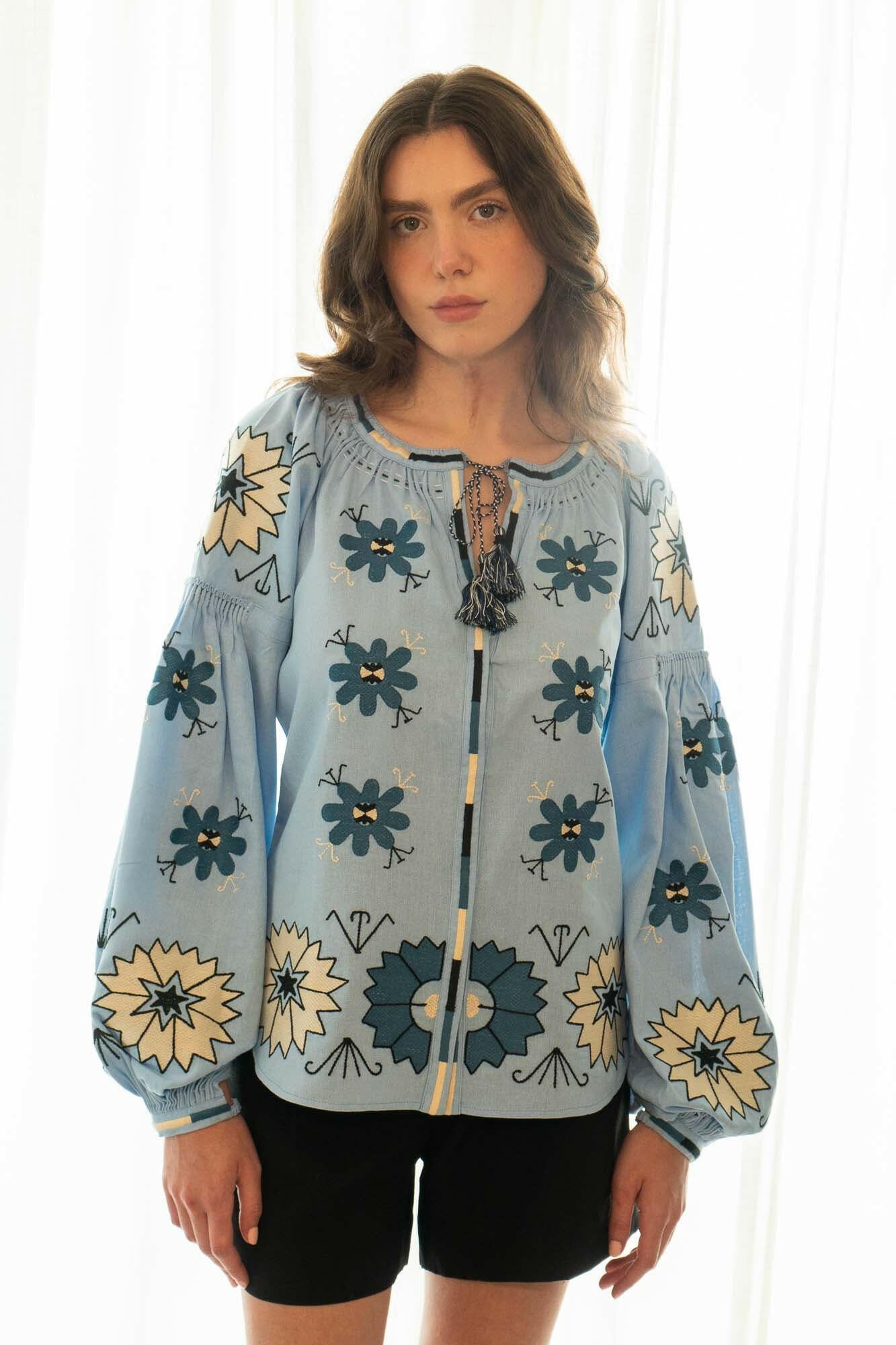 The Ivanna Blouse in Peaceful Sky — Embroidered Linen Blend Top by Amorrre – Luxury Resortwear, Embroidered Dresses & Kaftans.