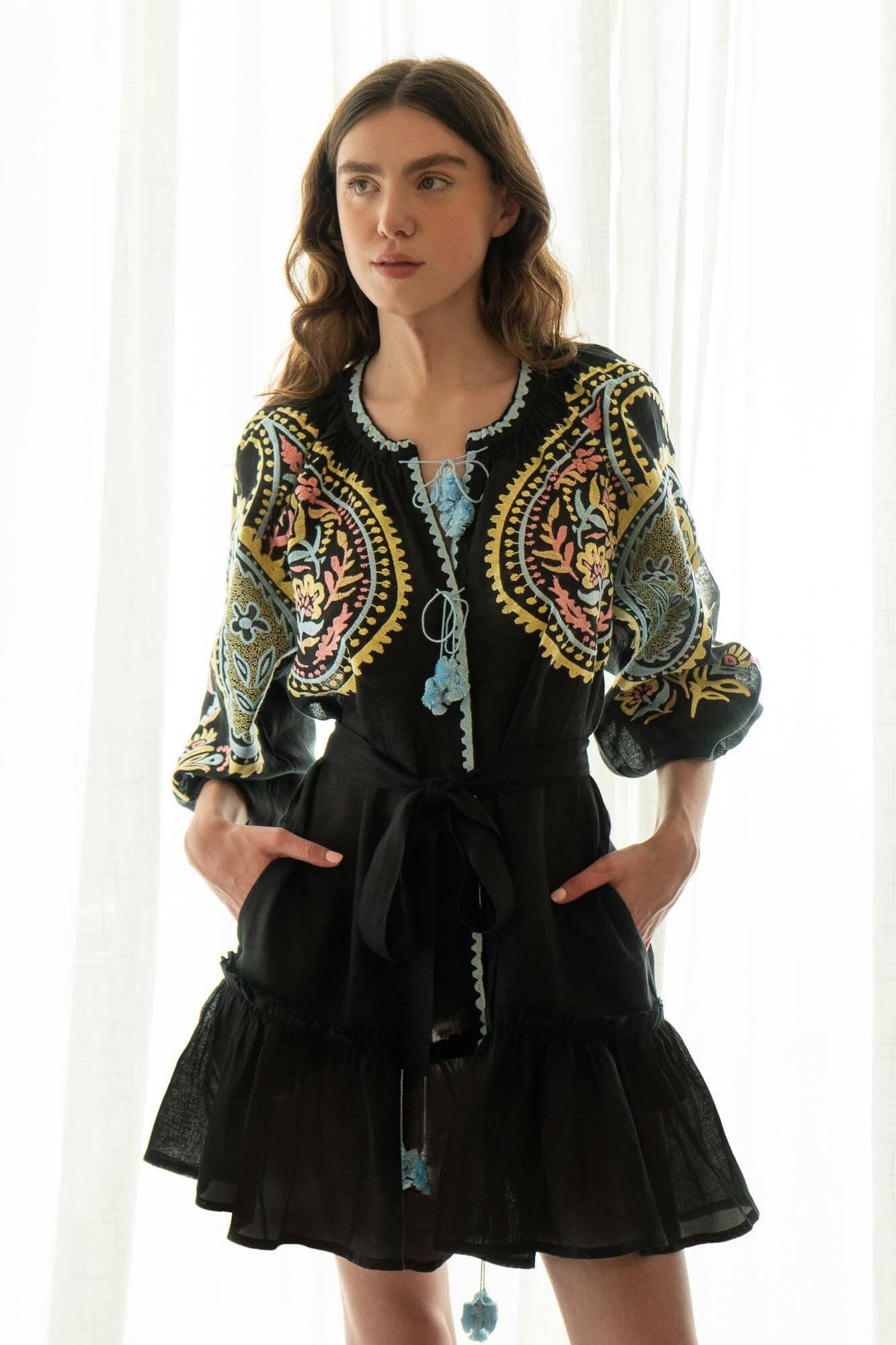 The Sara Flared Dress in Folk Black — Embroidered Linen Long Sleeve Cover-up by Amorrre – Luxury Resortwear, Embroidered Dresses & Kaftans.